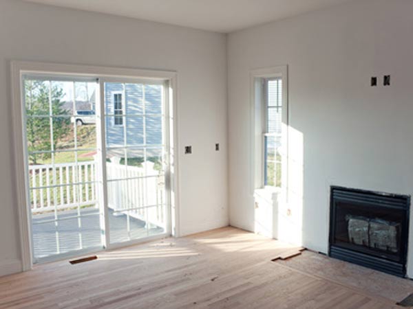 empty living room with fireplace